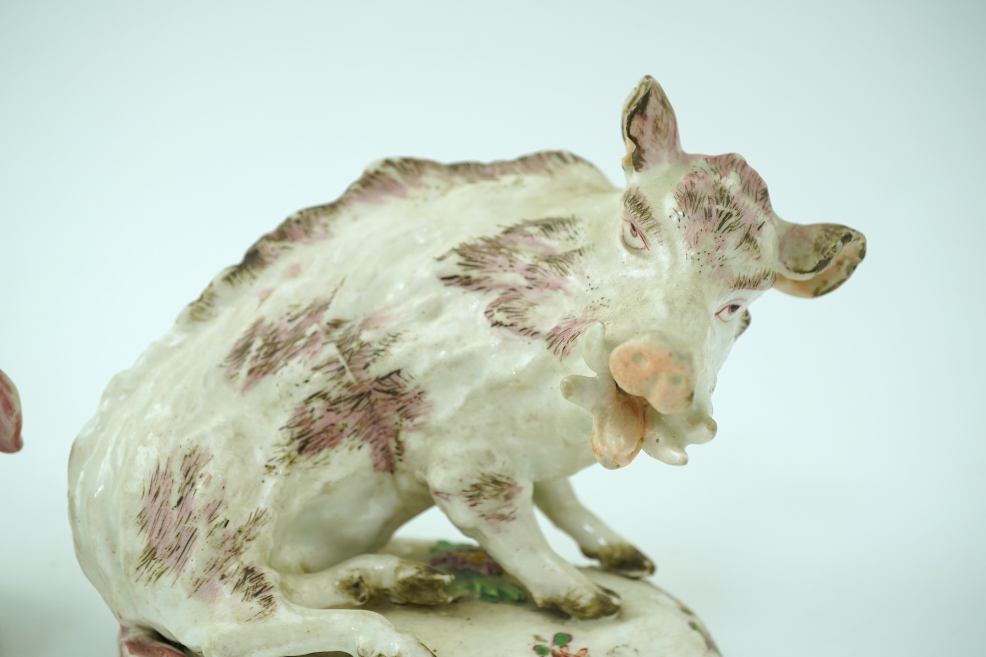 A pair of early Derby porcelain models of wild boars, c.1752-55